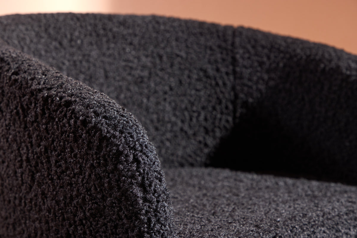 Fluffy fåtölj, svart teddytyg